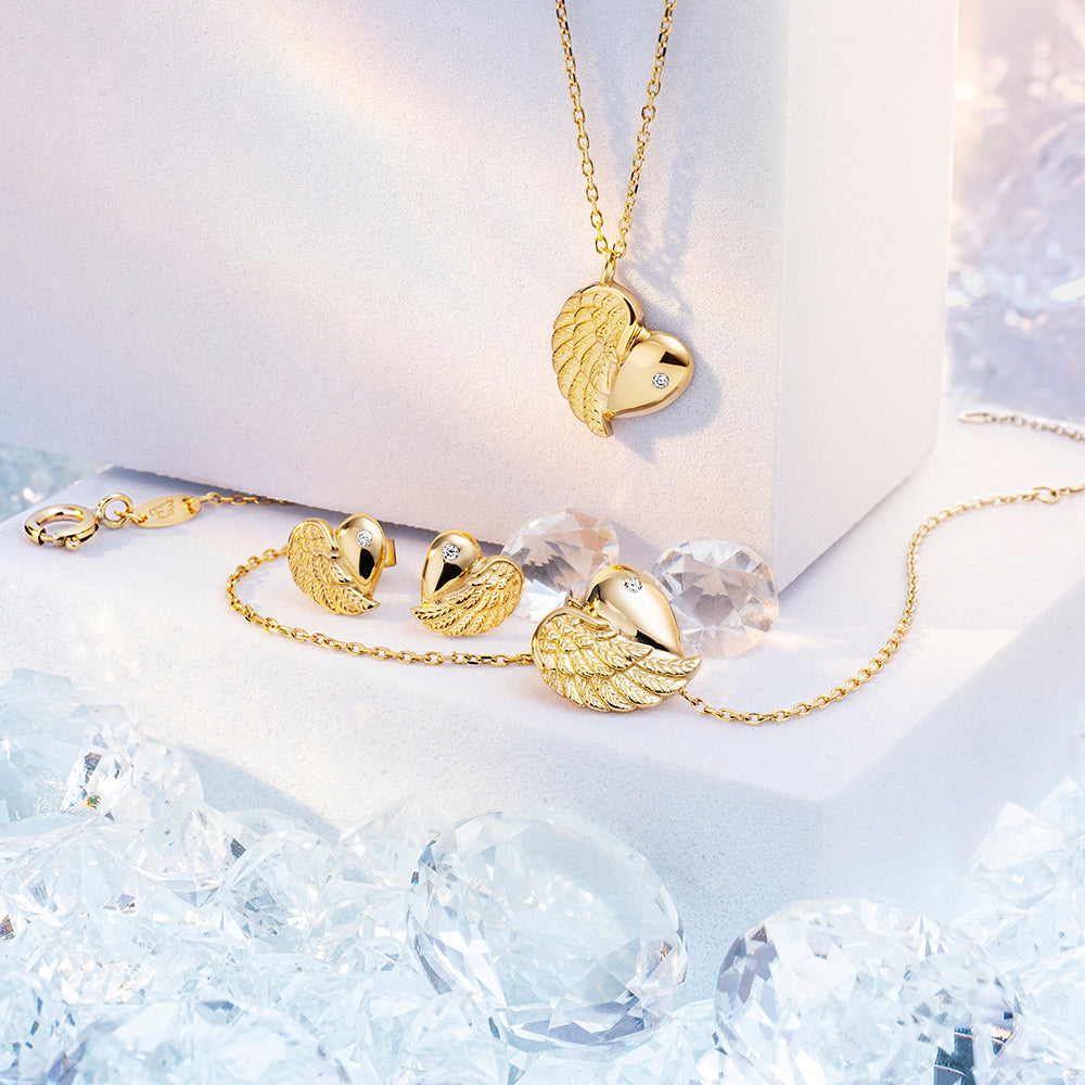 Ohrstecker 375er Echtgold Herzflügel mit Diamant